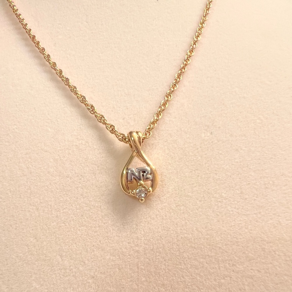 Nina Ricci Gold Pendant Necklace